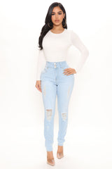 On Edge Ripped Skinny Jeans - Light Blue Wash